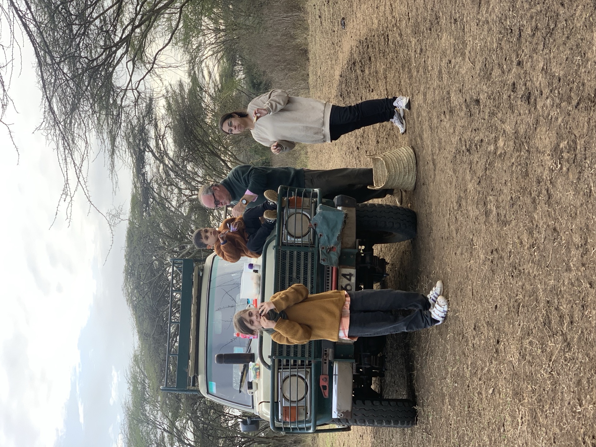 Safari group beside the Land Cruiser at Silole Sanctuary